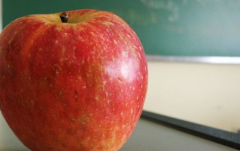 Apple on teacher's desk