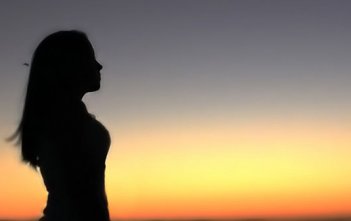 woman silhouette sunset