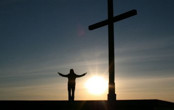 person standing at cross